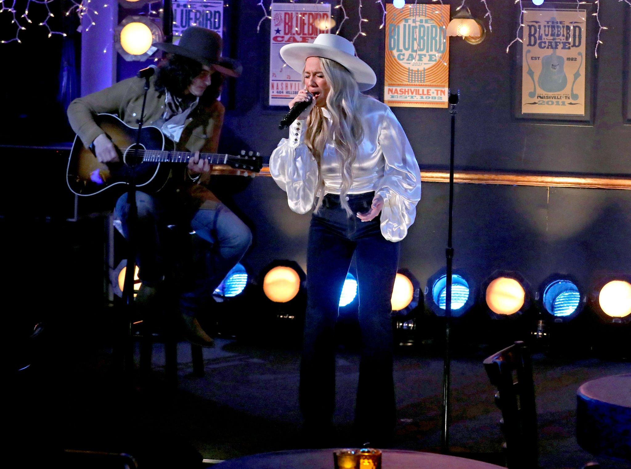 Gabby Barrett and husband Cade Foehner performing "The Good Ones" on the 56th ACM Awards at The Bluebird Cafe in Nashville, TN. 
